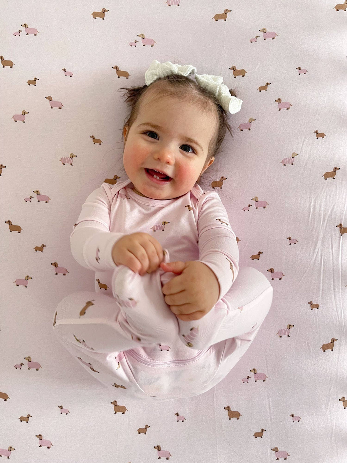 Baby wearing a new boutique outfit from Wild Lapin Children's Boutique's New Arrivals Collection