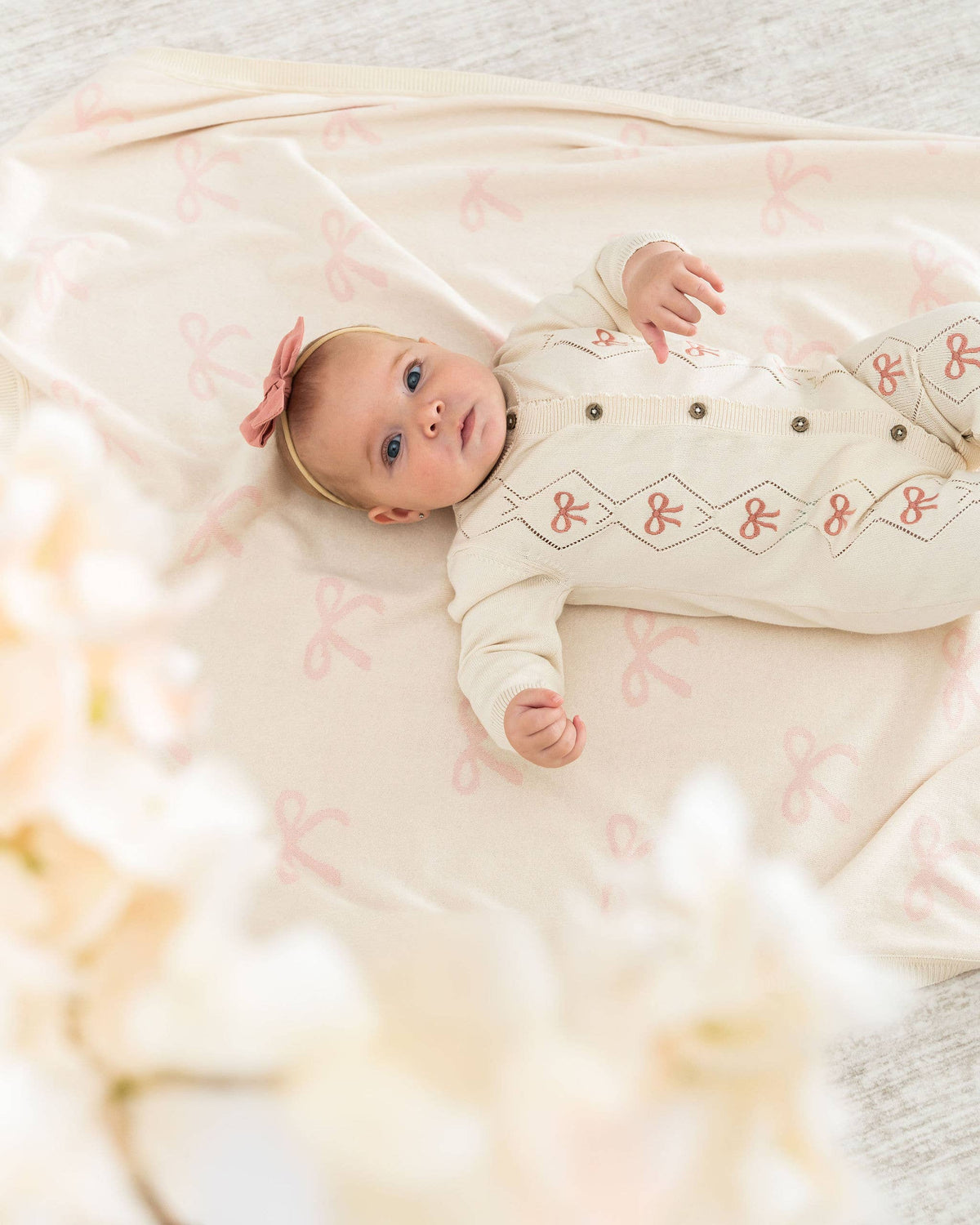 Evie Bow Pointelle Knit Baby Jumpsuit (Organic Cotton): Ecru