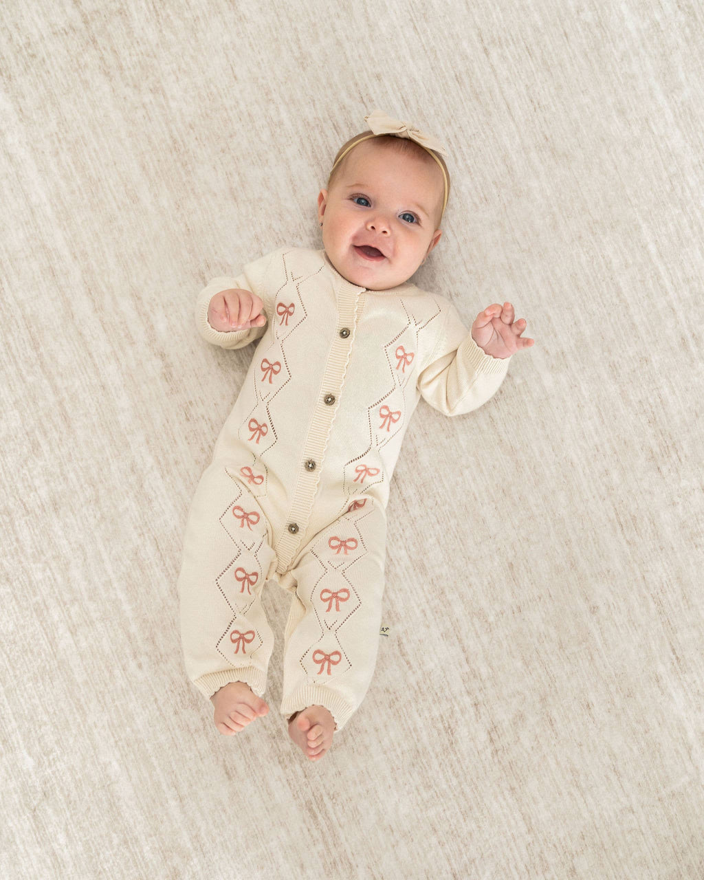 Evie Bow Pointelle Knit Baby Jumpsuit (Organic Cotton): Ecru