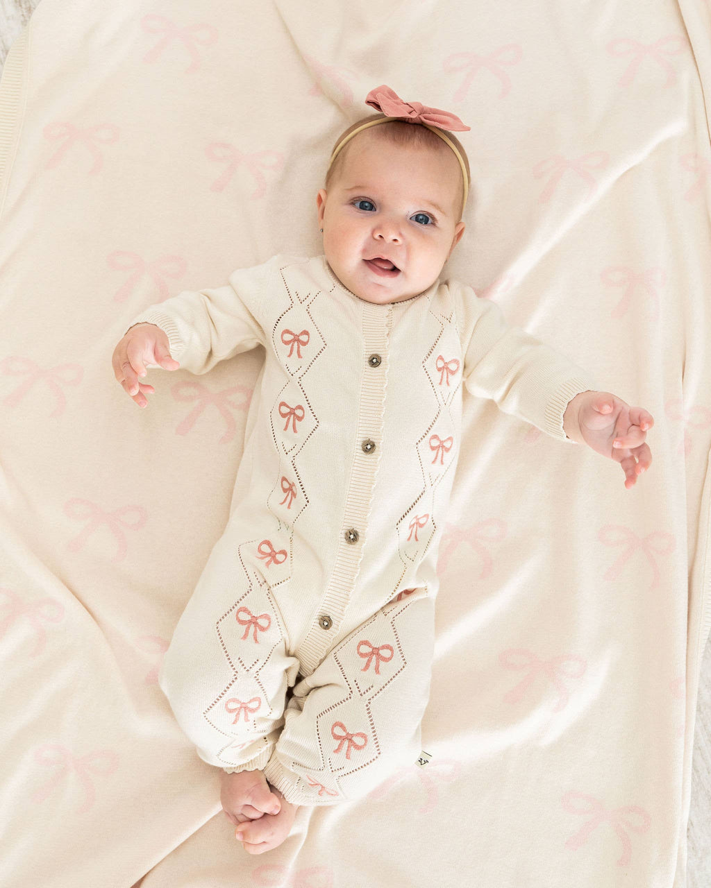Evie Bow Pointelle Knit Baby Jumpsuit (Organic Cotton): Ecru