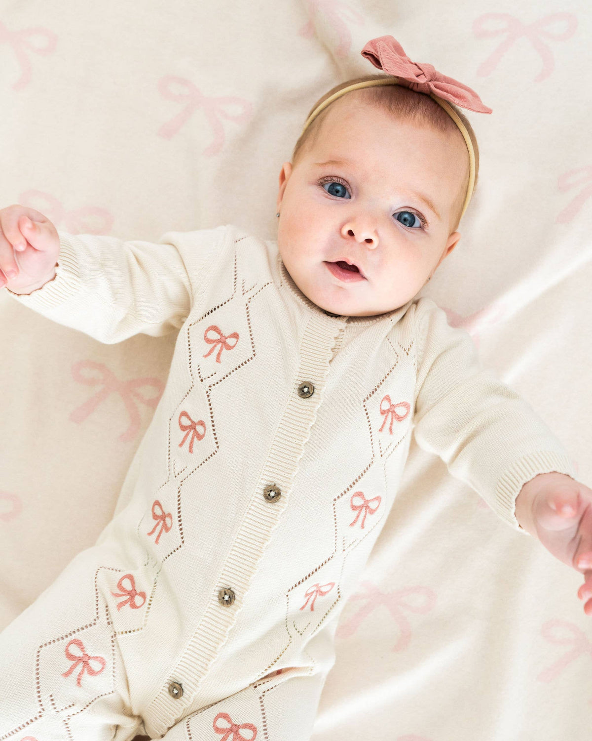 Evie Bow Pointelle Knit Baby Jumpsuit (Organic Cotton): Ecru